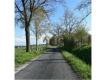 Terrain de 1120m avec Cadre de Verdure Paisible -  5 min du page de l'A89 Lyon/Clermont Loire Amions